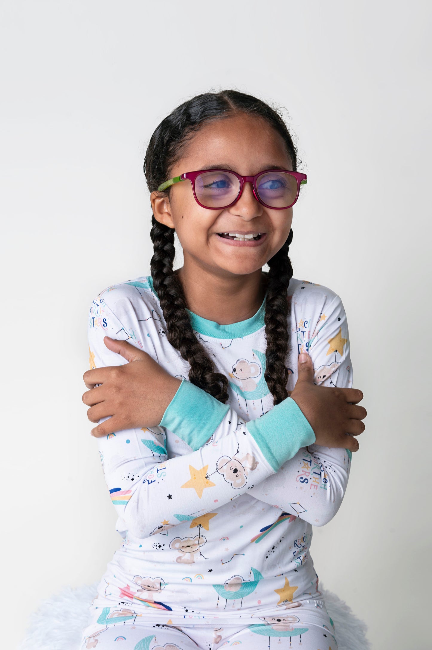 Child featured wearing soft bamboo pajamas featuring Kenny the Koala.