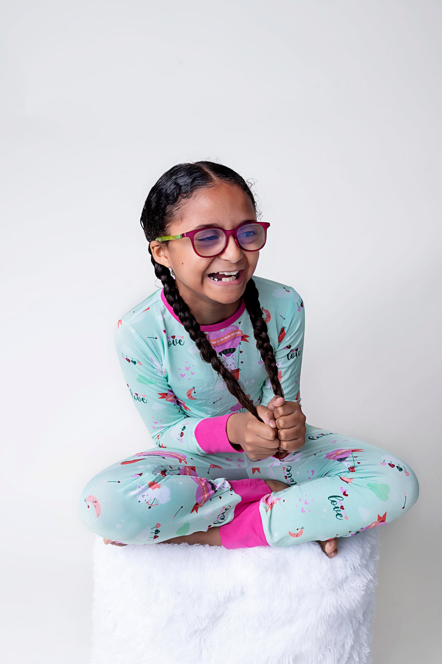 child wearing Cupid the Bunny themed print on bamboo kids pajamas