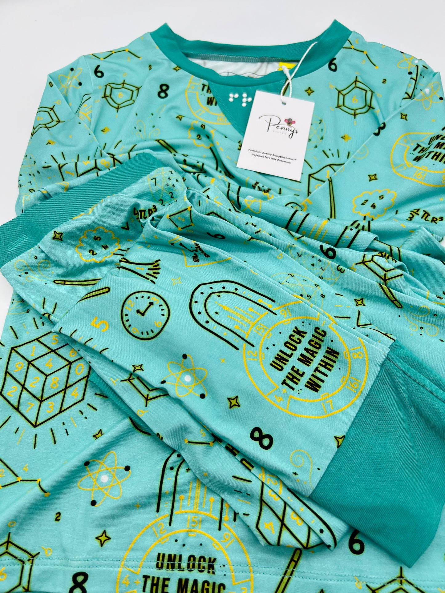 Close-up of braille and pattern on Ellie the Explorer kids pajamas