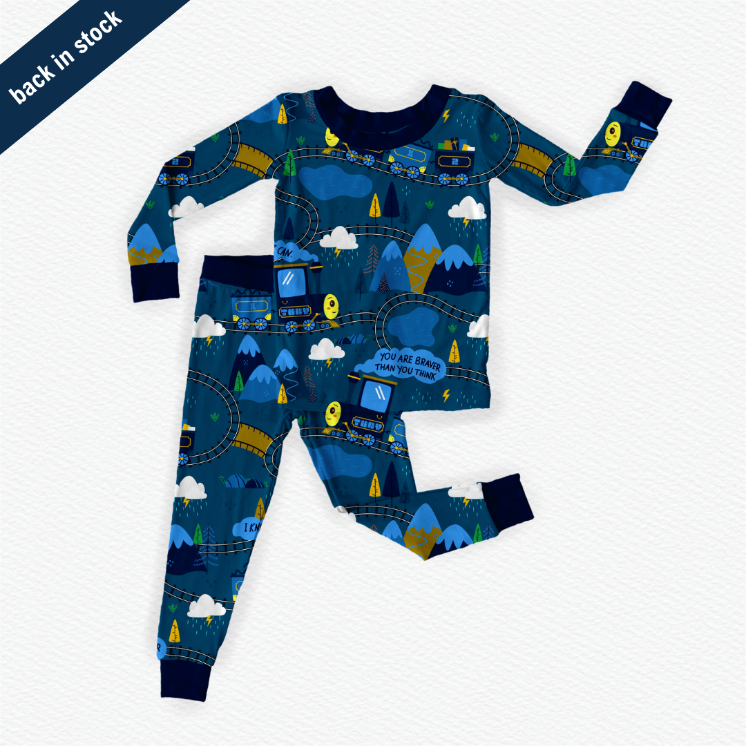 Blue bamboo kids pajamas featuring Toby the Train with braille label