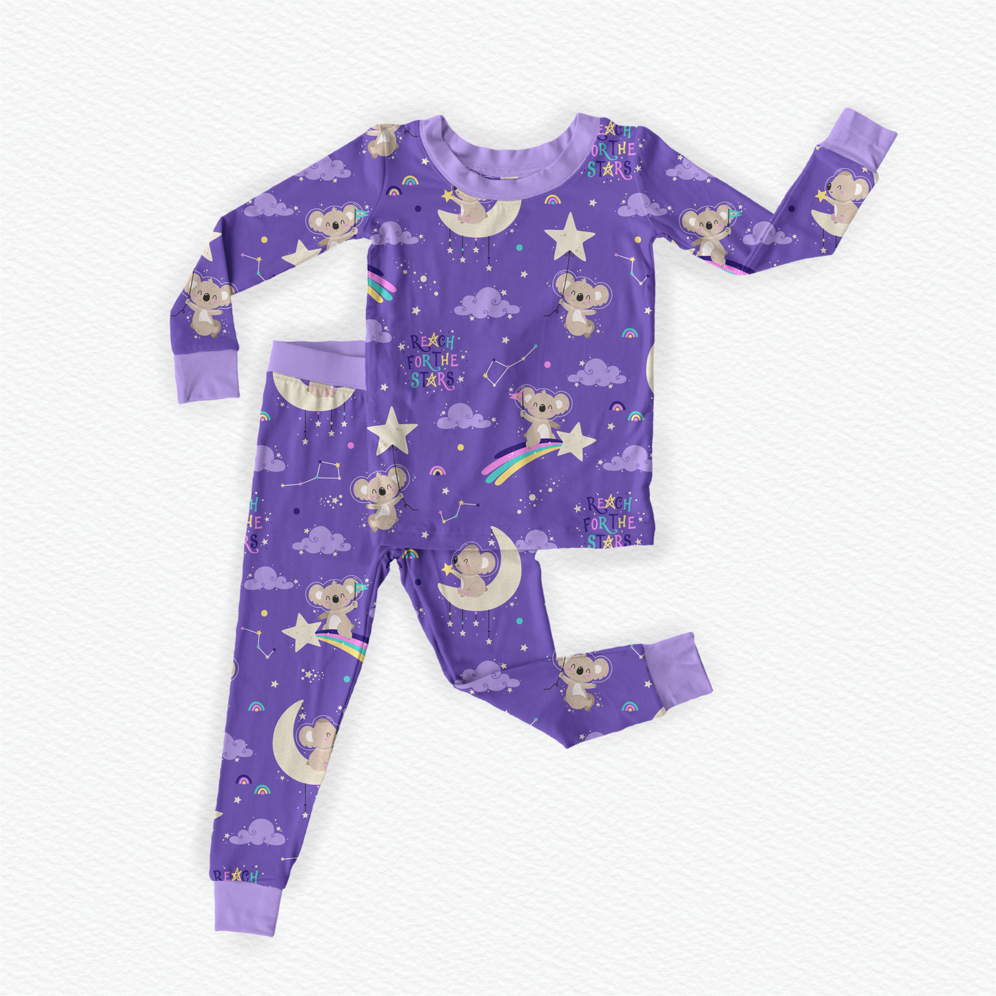 Purple bamboo kids pajamas featuring a Koala in space theme